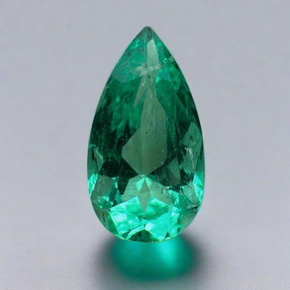 1.55 CARAT 10X6 VVS CLARITY
GREEN NATURAL LOOSE
COLOMBIAN EMERALD-PEAR
CUT